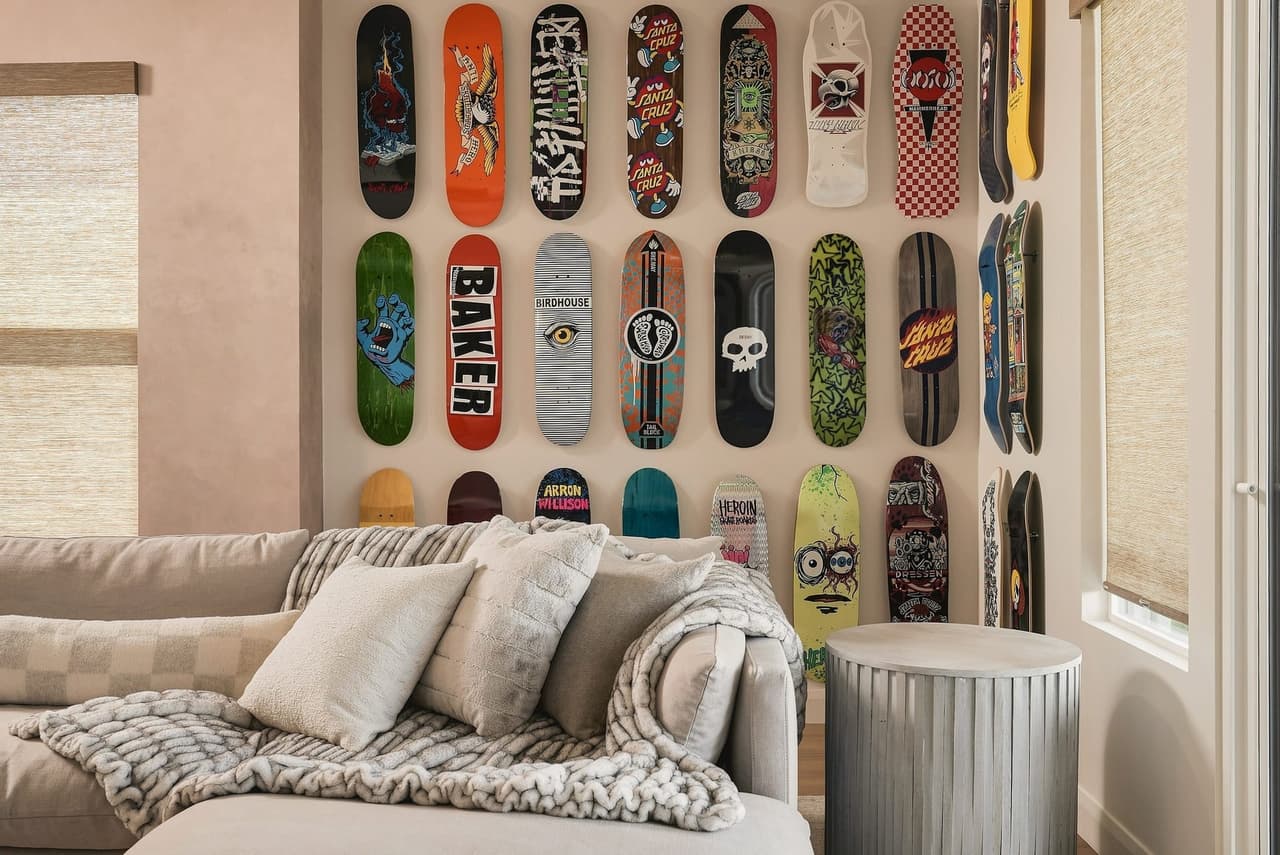Skate-deck feature wall in the Zephyr House rec room