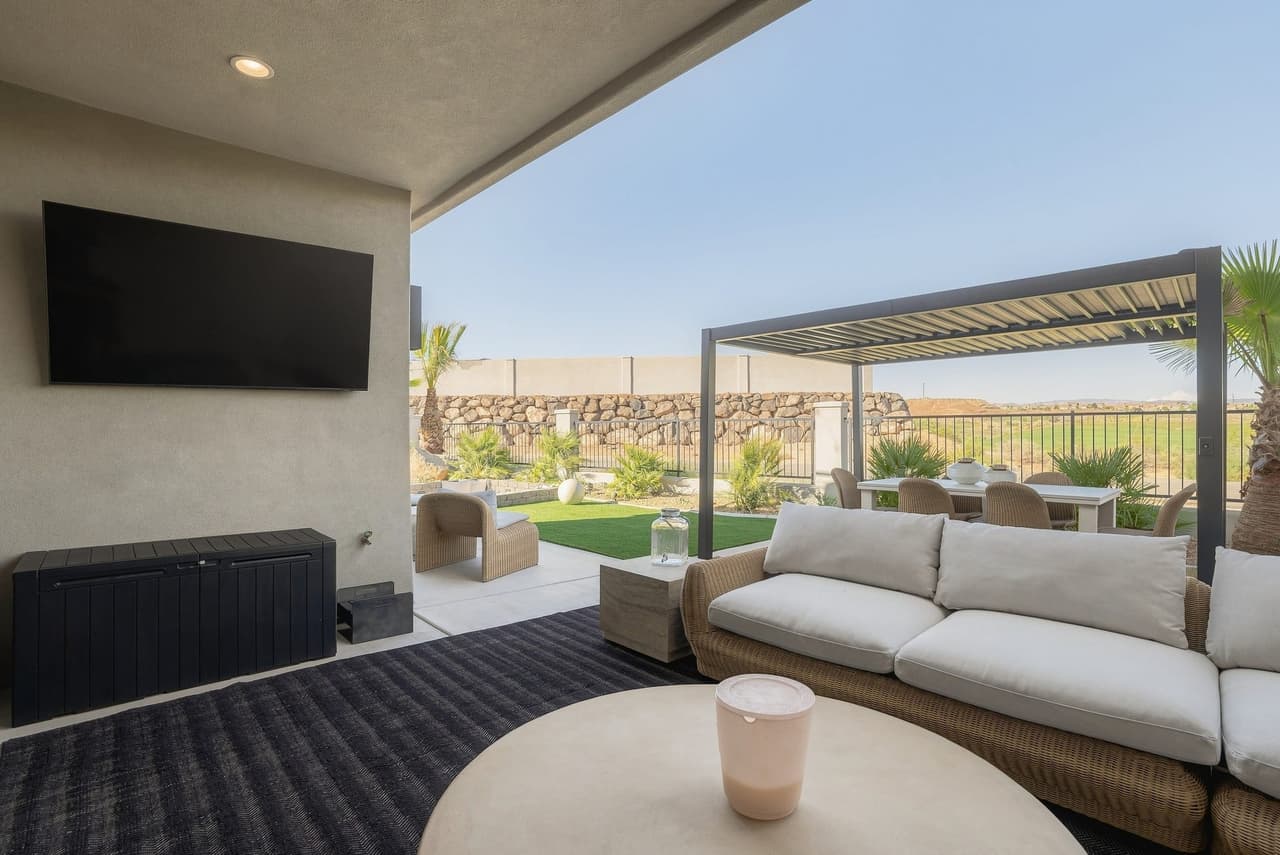 Outdoor lounge and television at Zephyr House